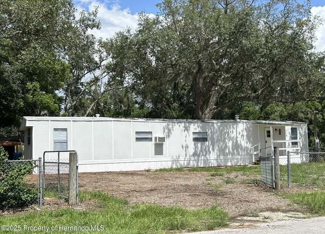 Property at 3236 Painters St, Spring Hill, FL 34606, 3 beds, 2 baths
