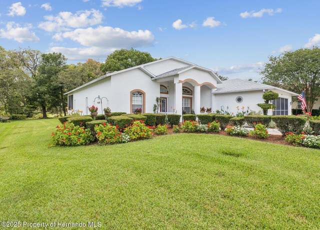 Property at 489 Tournament Dr, Spring Hill, FL 34608, 3 beds, 2 baths