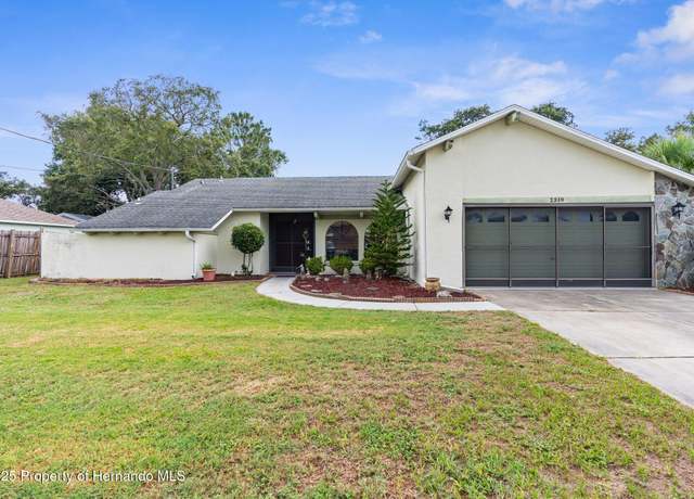 Property at 2319 Canfield Dr, Spring Hill, FL 34609, 4 beds, 2 baths