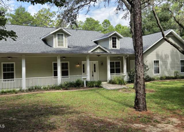 Property at 16357 Pawnee Dr, Brooksville, FL 34601, 5 beds, 4 baths