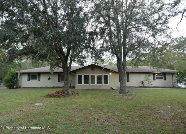 Property at 6057 Boatwrite Rd, Brooksville, FL 34609, 4 beds, 4 baths