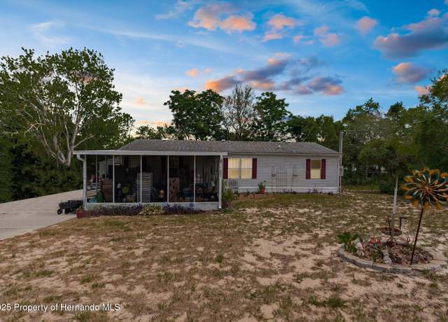 Property at 6490 Evanston St, Weeki Wachee, FL 34613, 4 beds, 2 baths