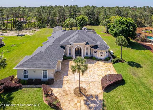 Property at 11166 Warm Wind Way, Weeki Wachee, FL 34613, 3 beds, 3 baths