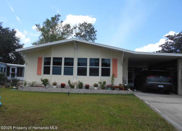 Property at 14228 Nickelodeon St, Brooksville, FL 34613, 3 beds, 2 baths