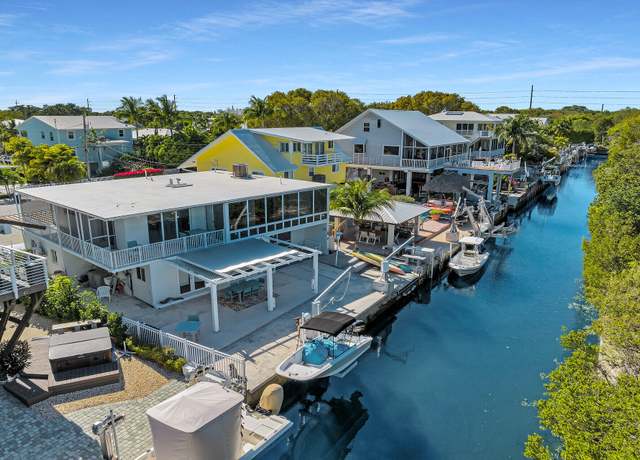 Property at 1207 Mockingbird Rd, Key Largo, FL 33037, 4 beds, 4.5 baths