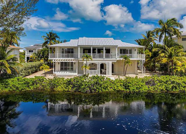 Property at 106 San Juan Dr Unit & Boat Slip, Plantation Key, FL 33036, 3 beds, 3 baths
