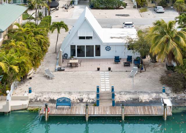 Property at 451 4Th St, Key Colony, FL 33051, 2 beds, 2.5 baths