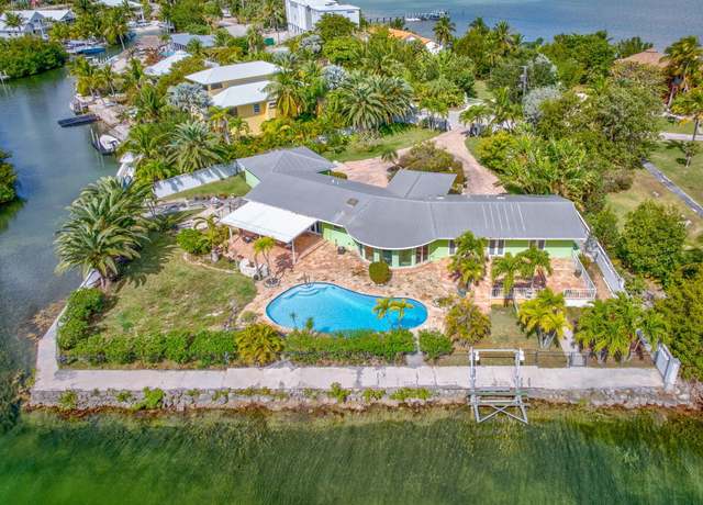 Property at 1068 E Buttonwood Dr, Sugarloaf Key, FL 33042, 4 beds, 3 baths