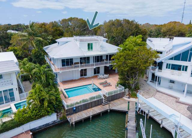 Property at 109 South Dr, Plantation Key, FL 33036, 4 beds, 3 baths