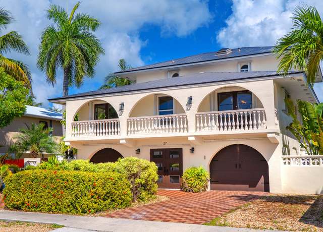 Property at 27 Evergreen Ave, Key Haven, FL 33040, 4 beds, 3.5 baths