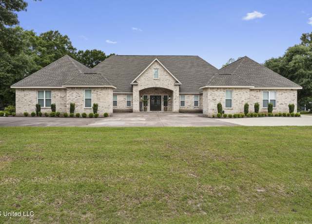Property at 7411 Woodland Dr, Pass Christian, MS 39571, 4 beds, 4.5 baths