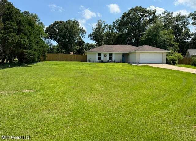 Property at 8715 Pine Ridge Blvd, Diamondhead, MS 39525, 4 beds, 2 baths