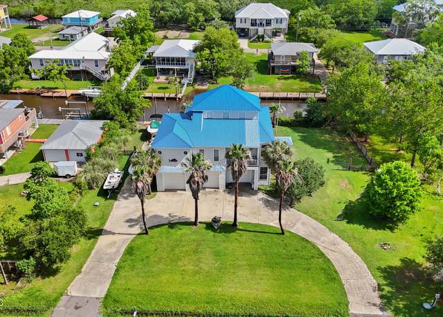 Property at 4020 Nineteenth St, Bay Saint Louis, MS 39520, 4 beds, 3 baths