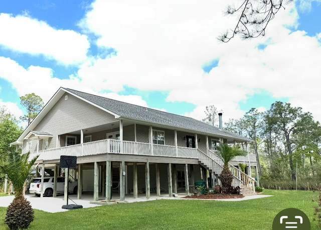 Property at 6187 1st St, Bay Saint Louis, MS 39520, 4 beds, 3.5 baths