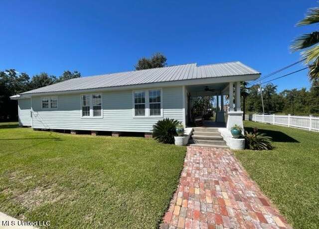 Property at 524 Main St, Bay Saint Louis, MS 39520, 3 beds, 3 baths