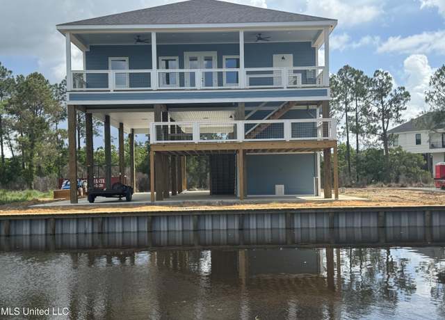 Property at 5009 Alaska St, Bay Saint Louis, MS 39520, 4 beds, 3 baths