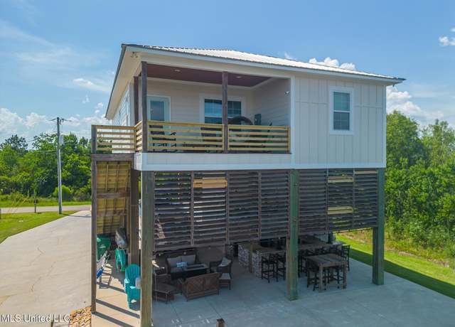 Property at 4032 N Sumatra St, Bay Saint Louis, MS 39520, 4 beds, 2 baths