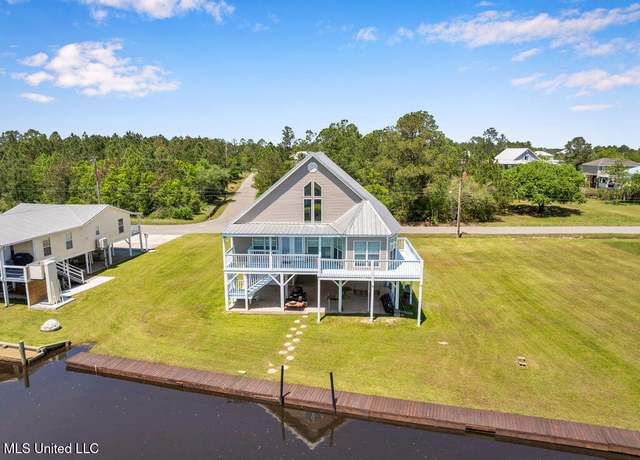 Property at 5051 Virginia St, Bay Saint Louis, MS 39520, 4 beds, 3 baths