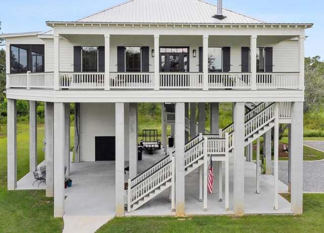 Property at 106 Burnett St, Bay Saint Louis, MS 39520, 4 beds, 2.5 baths