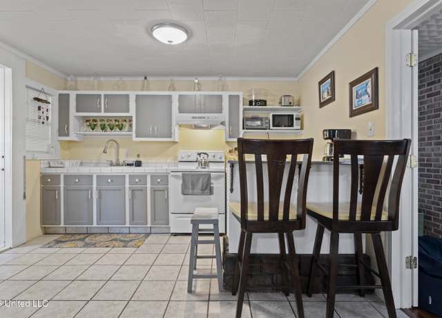 Property at 240 Sycamore St, Bay Saint Louis, MS 39520, 3 beds, 2 baths