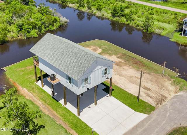 Property at 11159 New York St, Bay Saint Louis, MS 39520, 3 beds, 2 baths