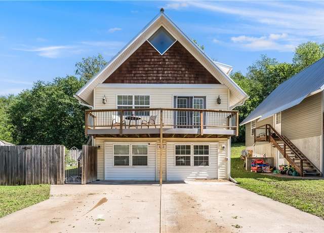 Property at 413 W Tahlequah St, Siloam Springs, AR 72761, 4 beds, 3.5 baths
