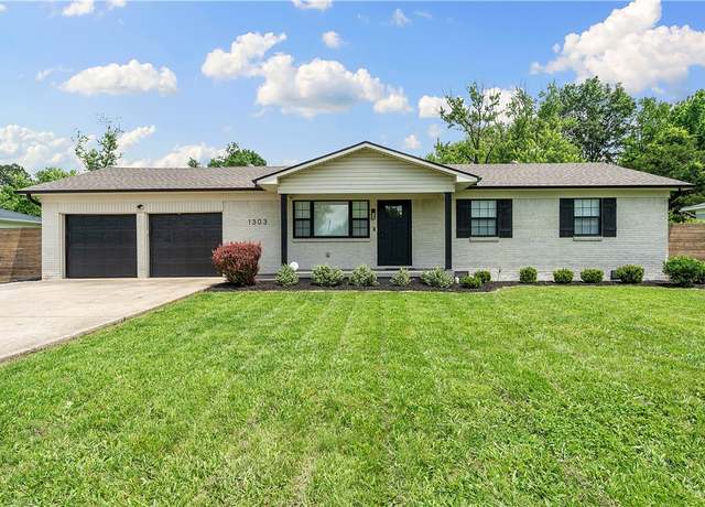 Property at 1303 SE D St, Bentonville, AR 72712, 4 beds, 2 baths