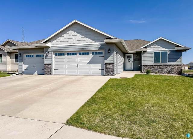 Property at 3704 E Brewster St, Sioux Falls, SD 57108, 4 beds, 3 baths