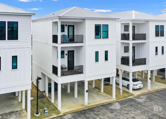 Property at 301 E 2nd St Unit F, Gulf Shores, AL 36542, 2 beds, 3 baths