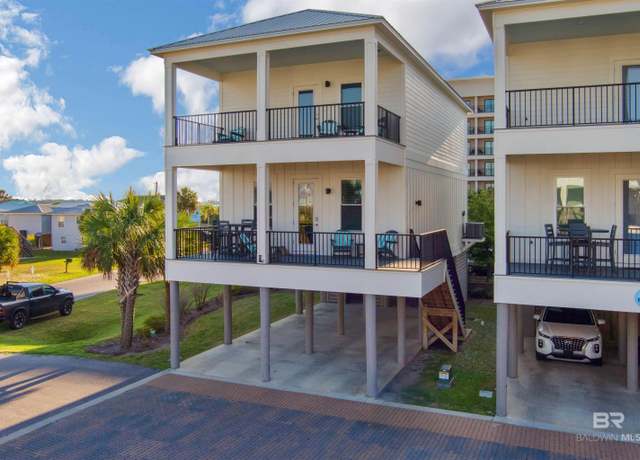 Property at 521 E 1st Ave, Gulf Shores, AL 36542, 4 beds, 4 baths