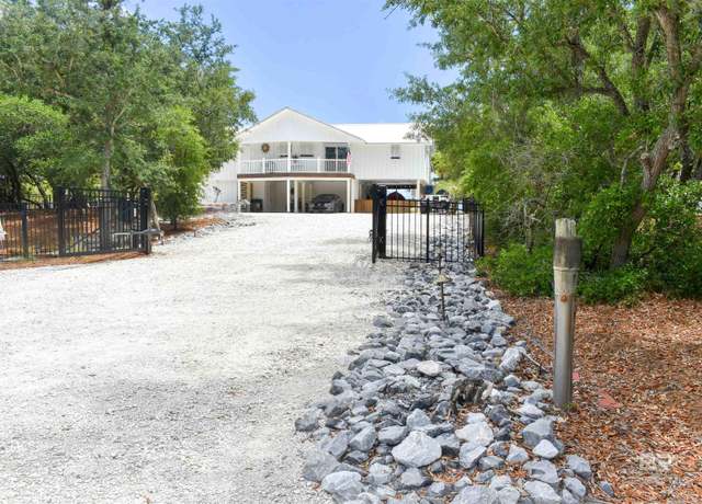 Property at 32130 River Rd, Orange Beach, AL 36561, 4 beds, 3 baths