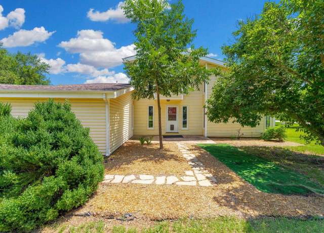 Property at 920 S Sharon Dr, Derby, KS 67037, 4 beds, 3 baths