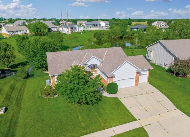 Property at 1421 N Lakeside Dr, Andover, KS 67002, 5 beds, 3 baths