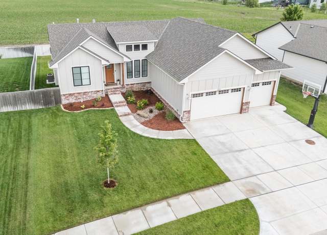 Property at 1100 W Travertine St, Andover, KS 67002, 6 beds, 3 baths