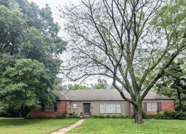 Property at 1002 N Stratford Ln, Wichita, KS 67206, 4 beds, 2.5 baths