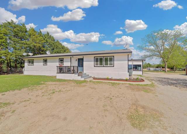 Property at 10450 S Webb Rd, Mulvane, KS 67110, 4 beds, 2 baths
