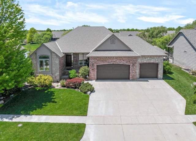 Property at 821 N Woodstone Dr, Andover, KS 67002, 6 beds, 3 baths