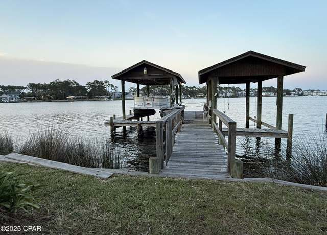 Property at 6722 S Lagoon Dr, Panama City, FL 32408, 5 beds, 4.5 baths