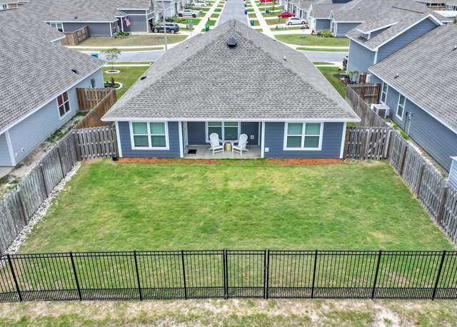 Property at 8470 Sun Point Dr, Panama City, FL 32404, 4 beds, 3 baths