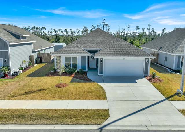 Property at 8470 Sun Point Dr, Panama City, FL 32404, 4 beds, 3 baths