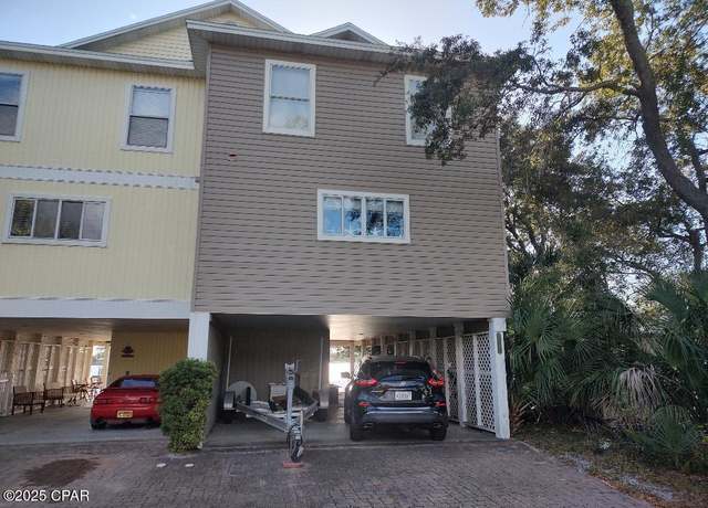 Property at 5833 N Lagoon Dr Unit A, Panama City Beach, FL 32408, 3 beds, 2.5 baths