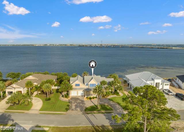 Property at 6417 Dolphin Shores Dr, Panama City Beach, FL 32407, 4 beds, 3.5 baths