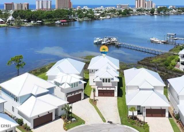 Property at 6627 N Lagoon Dr, Panama City Beach, FL 32408, 5 beds, 4.5 baths