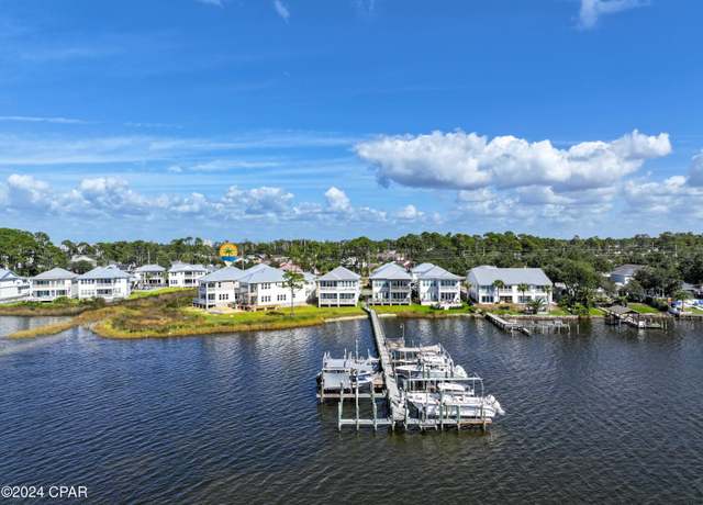 Property at 6627 N Lagoon Dr, Panama City Beach, FL 32408, 5 beds, 4.5 baths