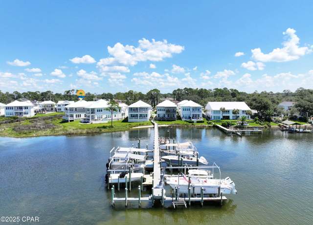 Property at 6627 N Lagoon Dr, Panama City Beach, FL 32408, 5 beds, 4.5 baths