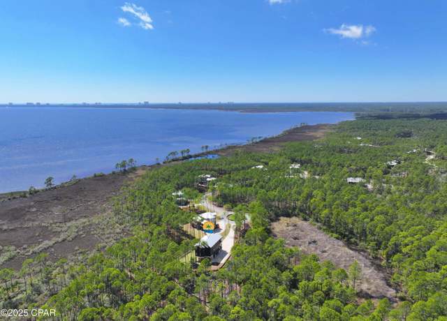 Property at 7603 Coastal Hammock Trl, Panama City Beach, FL 32413, 5 beds, 4 baths