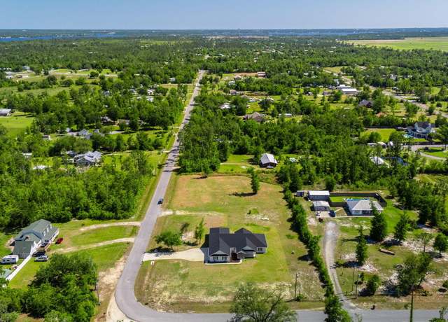 Property at 9407 N Mccann Rd, Southport, FL 32409, 4 beds, 2.5 baths