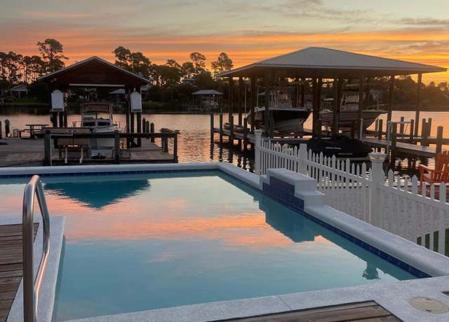 Property at 7320 S Lagoon Dr, Panama City, FL 32408, 4 beds, 3.5 baths