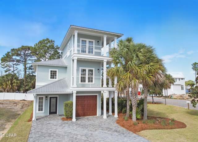 Property at 7900 S Lagoon Dr, Panama City, FL 32408, 4 beds, 3.5 baths