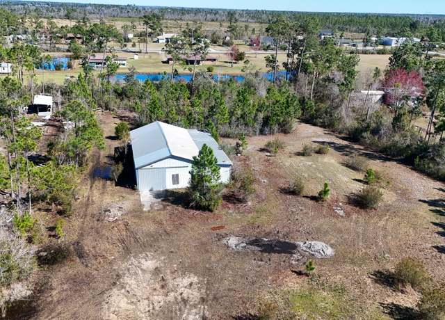 Property at 8022 S Holland Rd, Southport, FL 32409, 3 beds, 2 baths